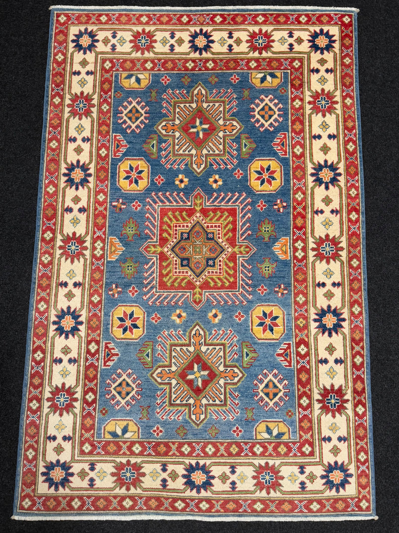 Handknuten Kazak‑matta — 184 × 117 cm