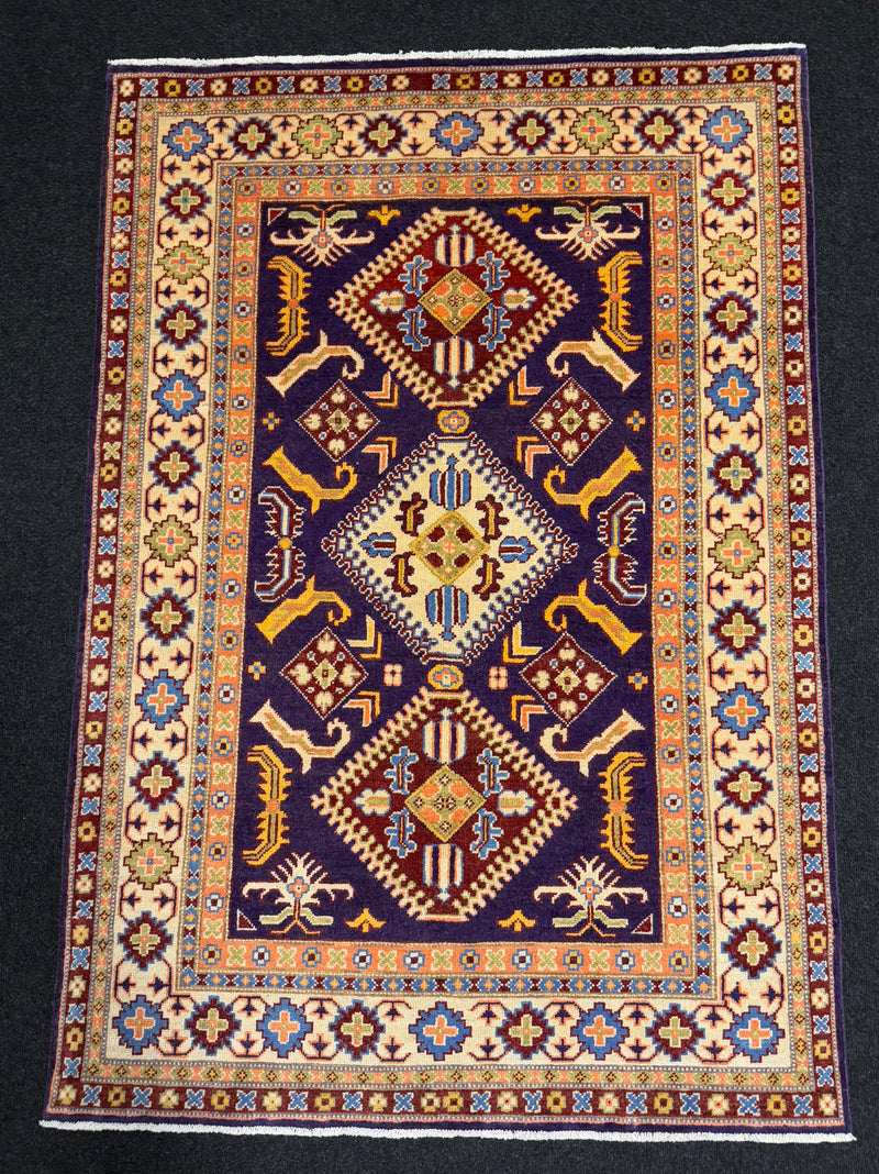 Handknuten Kazak‑matta — 182 × 124 cm