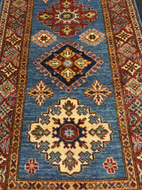Handknuten fine Kazak‑matta — 318 × 80 cm
