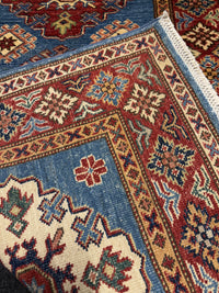 Handknuten fine Kazak‑matta — 318 × 80 cm