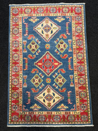 Handknuten Kazak‑matta — 130× 84 cm