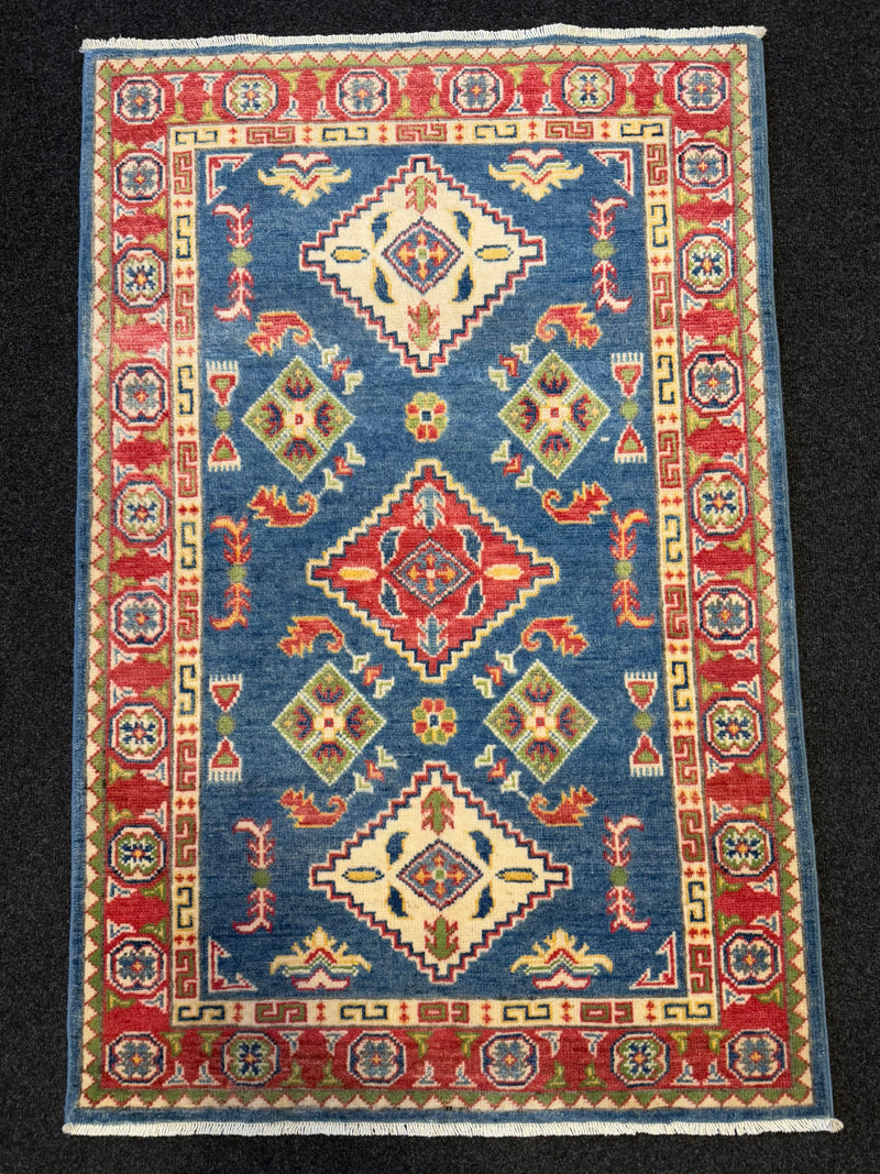 Handknuten Kazak‑matta — 130× 84 cm