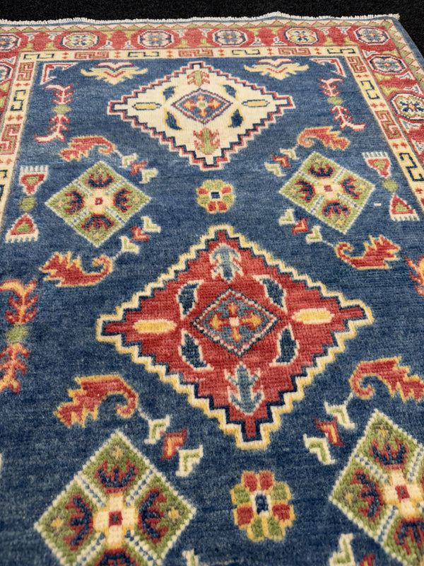 Handknuten Kazak‑matta — 130× 84 cm