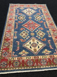 Handknuten Kazak‑matta — 130× 84 cm