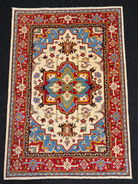 Handknuten Kazak‑matta — 180 × 124 cm