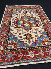 Handknuten Kazak‑matta — 180 × 124 cm