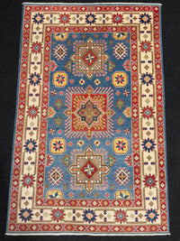 Handknuten Kazak‑matta — 184 × 117 cm