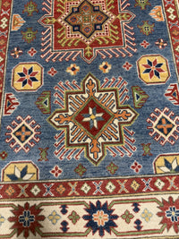 Handknuten Kazak‑matta — 184 × 117 cm