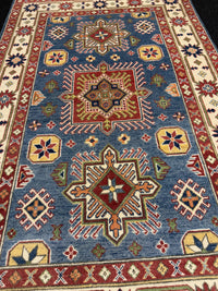 Handknuten Kazak‑matta — 184 × 117 cm