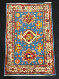 Handknuten Kazak‑matta — 181 × 119 cm