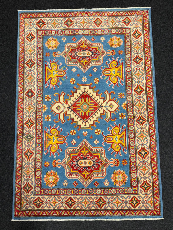 Handknuten Kazak‑matta — 181 × 119 cm