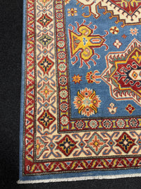 Handknuten Kazak‑matta — 181 × 119 cm