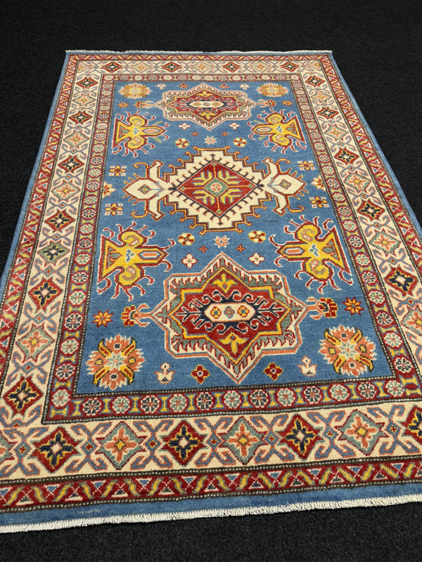 Handknuten Kazak‑matta — 181 × 119 cm