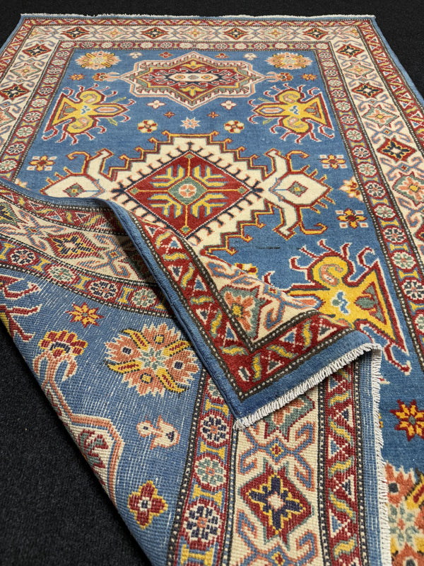 Handknuten Kazak‑matta — 181 × 119 cm