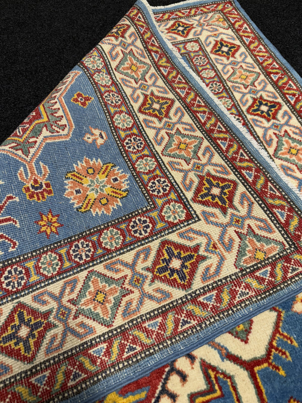 Handknuten Kazak‑matta — 181 × 119 cm