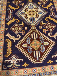 Handknuten Kazak‑matta — 182 × 124 cm