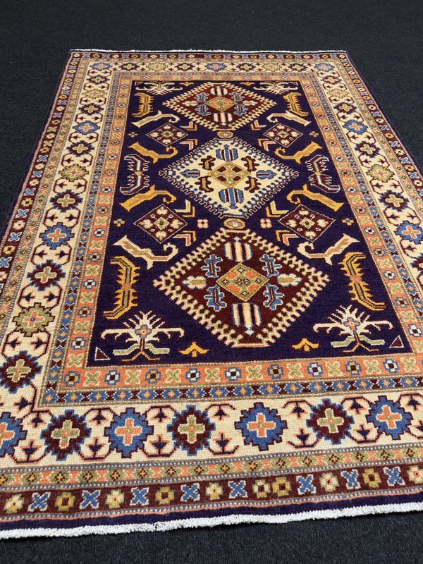 Handknuten Kazak‑matta — 182 × 124 cm