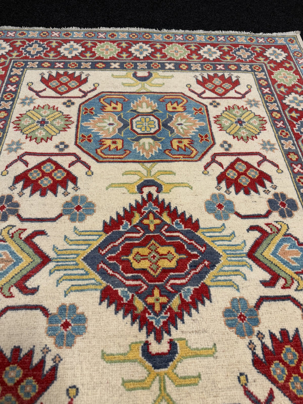 Handknuten Kazak‑matta — 178 × 119 cm