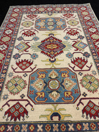 Handknuten Kazak‑matta — 178 × 119 cm