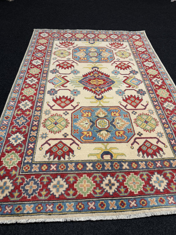 Handknuten Kazak‑matta — 178 × 119 cm