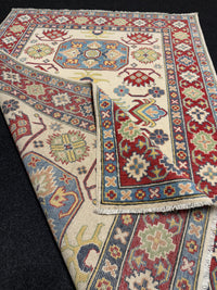 Handknuten Kazak‑matta — 178 × 119 cm