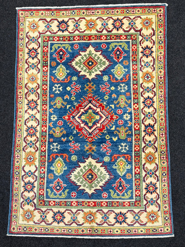 Handknuten Kazak‑matta — 146 × 87 cm