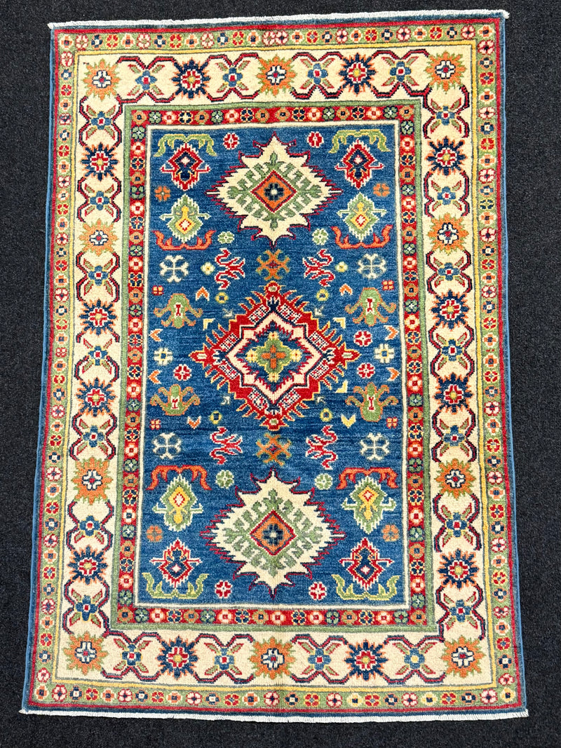 Handknuten Kazak‑matta — 146 × 87 cm