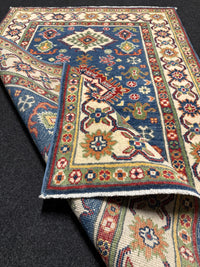 Handknuten Kazak‑matta — 146 × 87 cm