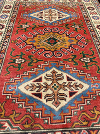 Handknuten Kazak‑matta — 150 × 104 cm