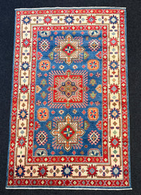 Handknuten Kazak‑matta — 188 × 119 cm