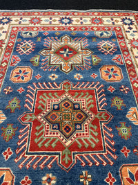 Handknuten Kazak‑matta — 188 × 119 cm