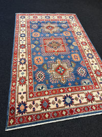 Handknuten Kazak‑matta — 188 × 119 cm