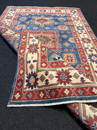 Handknuten Kazak‑matta — 188 × 119 cm