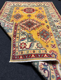 Handknuten Kazak‑matta — 181 × 119 cm